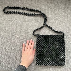 Small black wooden bead purse